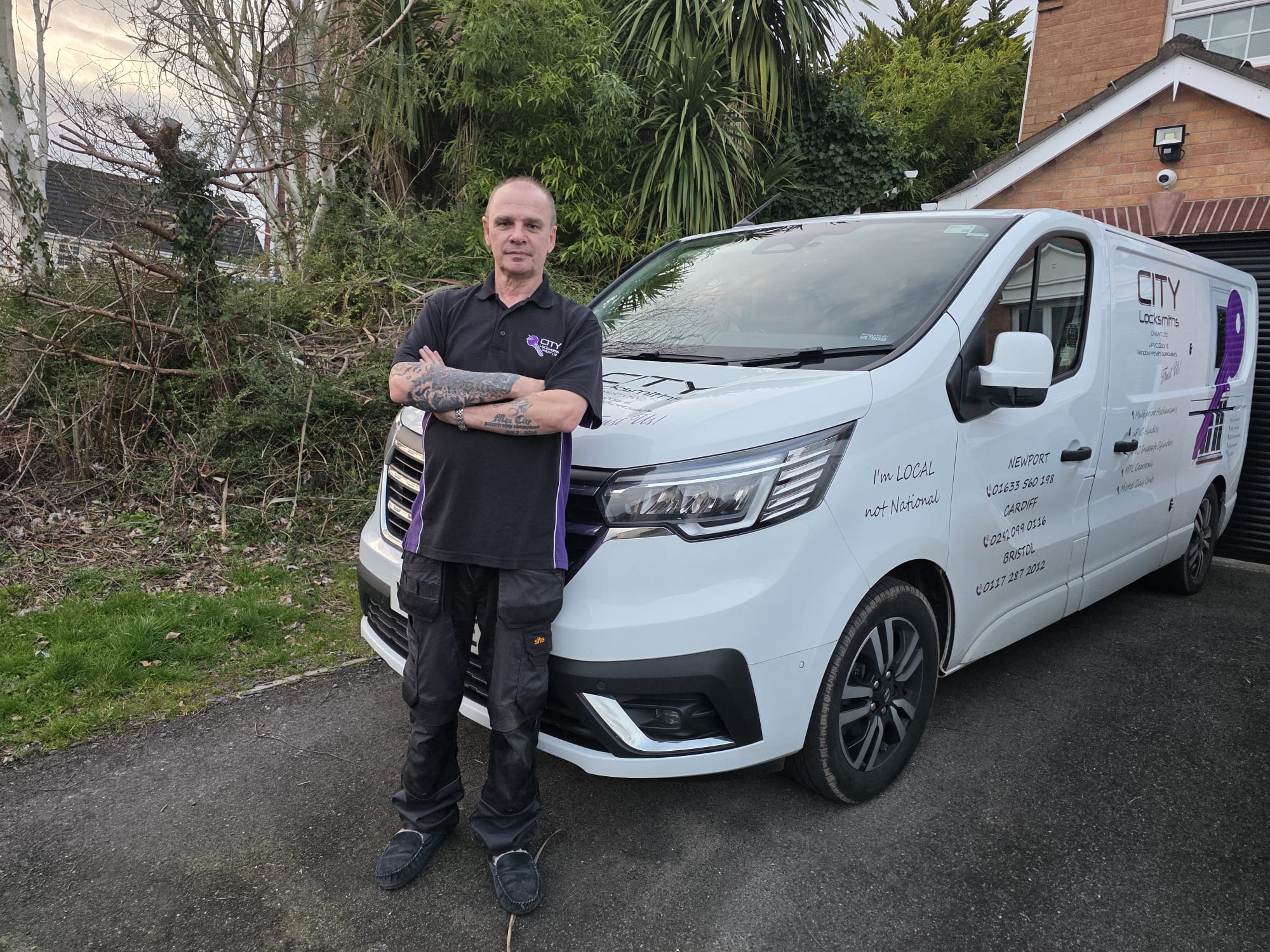 Nick from City Locksmiths Bristol standing next to his branded locksmith van